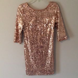 Never before worn rose gold sequin dress.